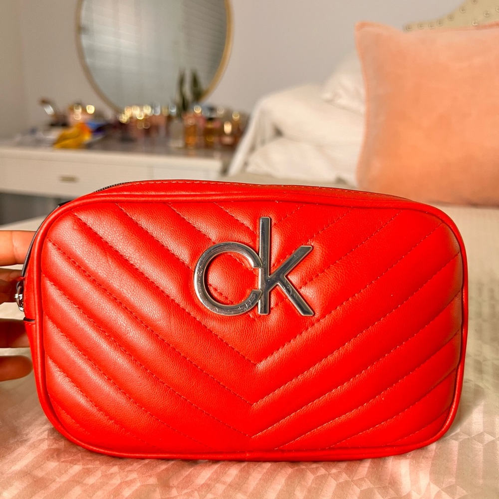 Red Calvin Klein belted fanny pack/crossbody